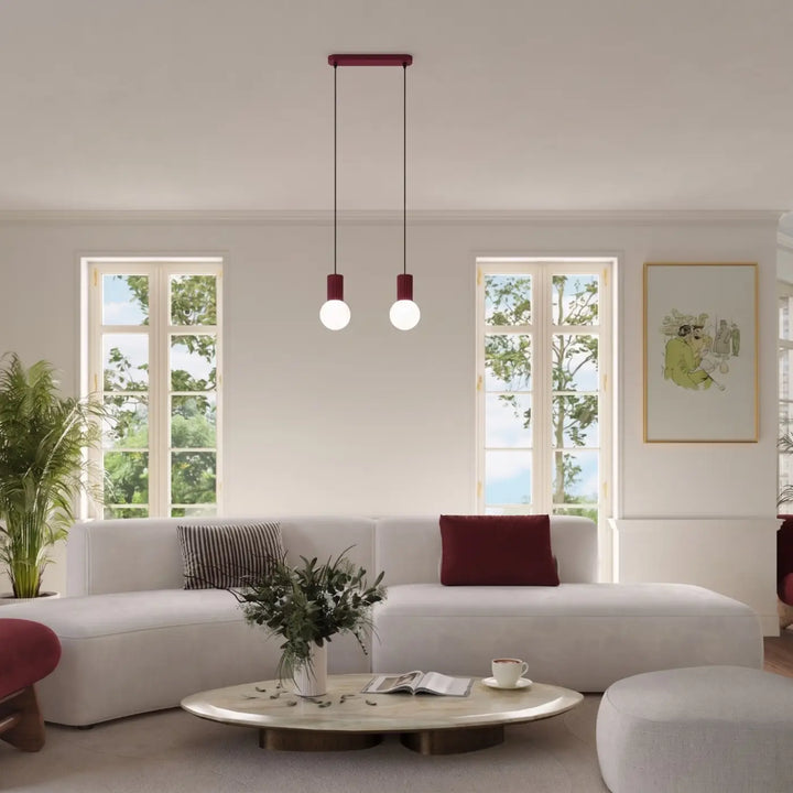Suspension Luminaire bordeaux dans un intérieur contemporain