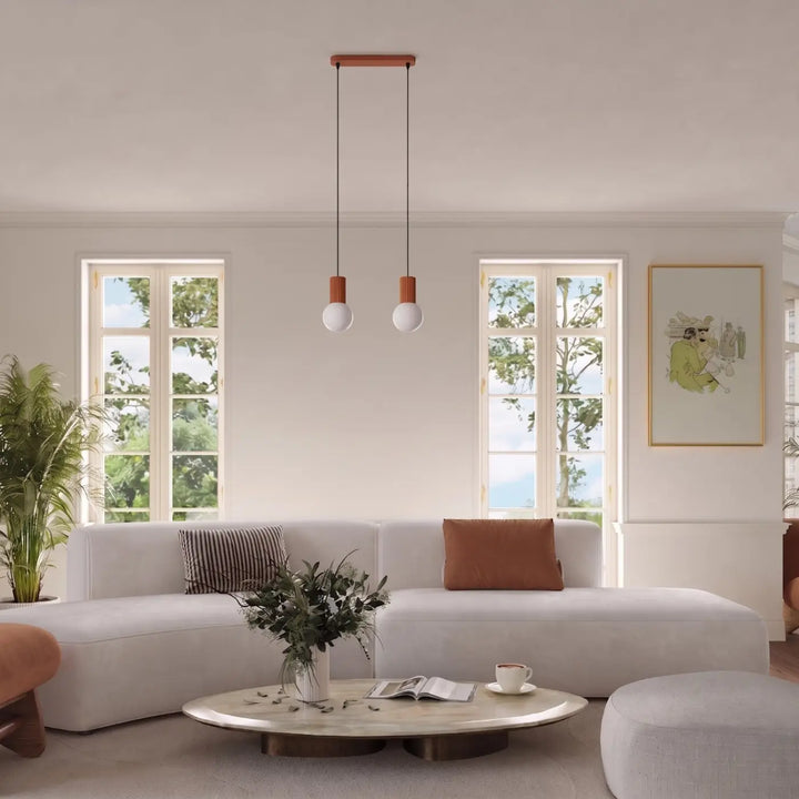 Suspension Luminaire ocre rouge dans un intérieur contemporain
