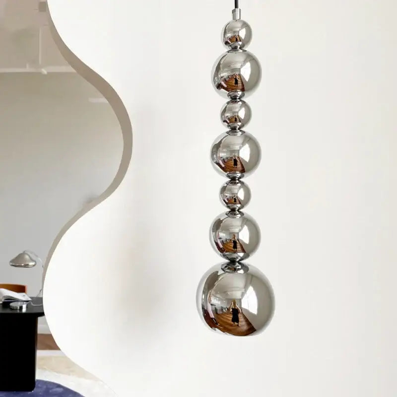 Suspension luminaire au style moderne en forme de totem vertical

