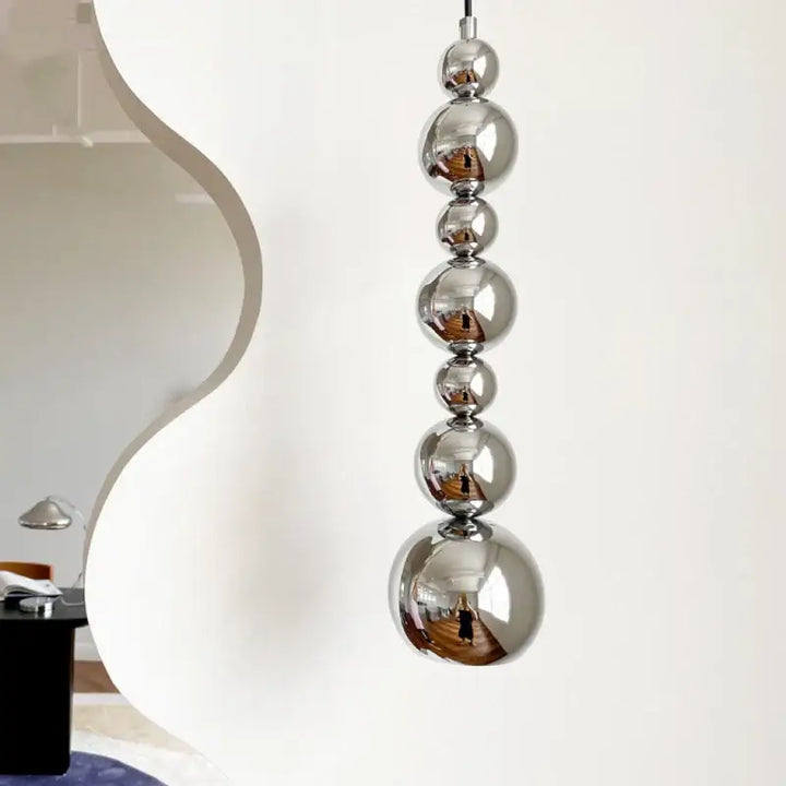 Suspension luminaire au style moderne en forme de totem vertical

