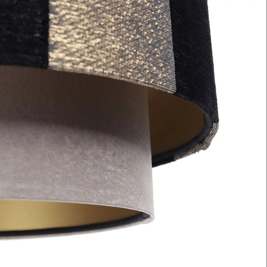 Suspension luminaire doblo en tissu texturé noir et doré avec doublure intérieure en suédine gris
