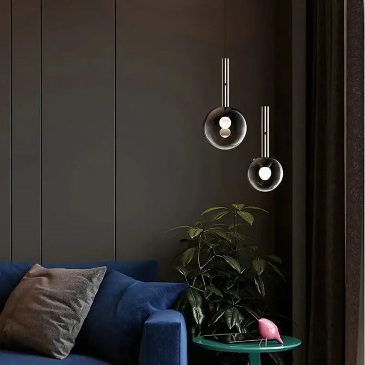 Suspension luminaire boule en verre fumé au style élégant
