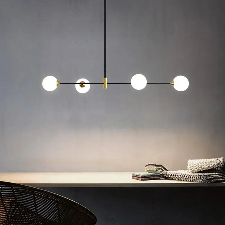 Suspension luminaire boules en verre et structure noire moderne