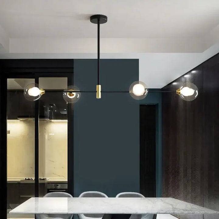 Suspension luminaire boules en verre et structure noire moderne