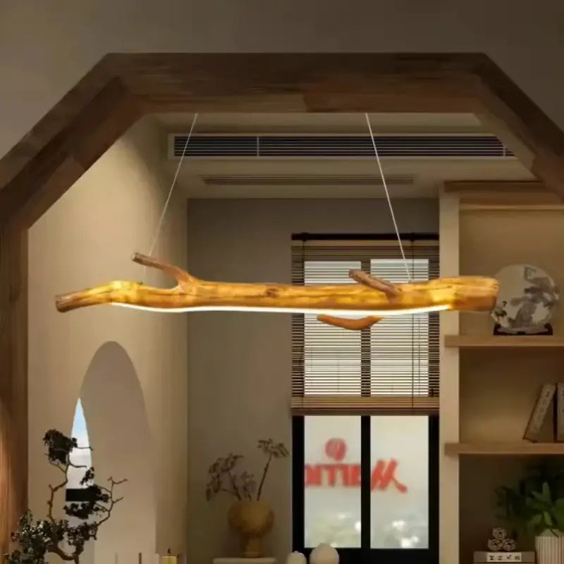 Suspension luminaire branche en bois brut naturel et chic