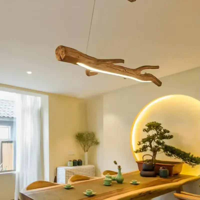 Suspension luminaire branche en bois brut naturel et chic