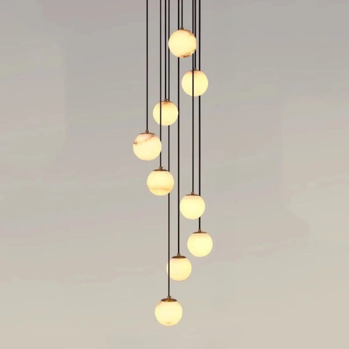 Suspension luminaire souble avec design suspension boules en verre marbré chic pour univers art déco moderne