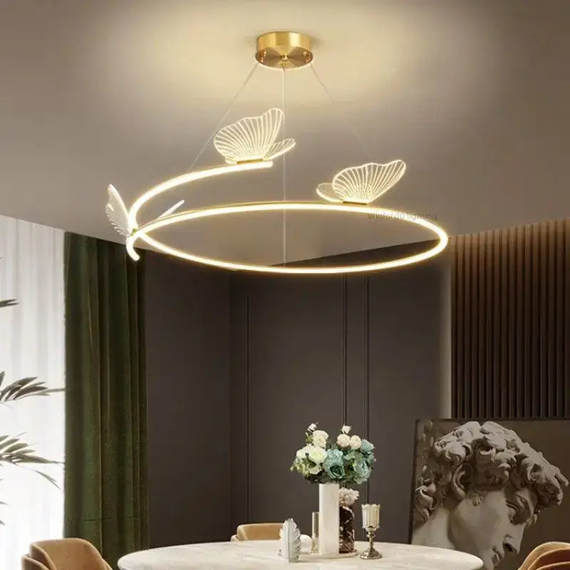Suspension luminaire circulaire LED avec 3 papillons dorés

