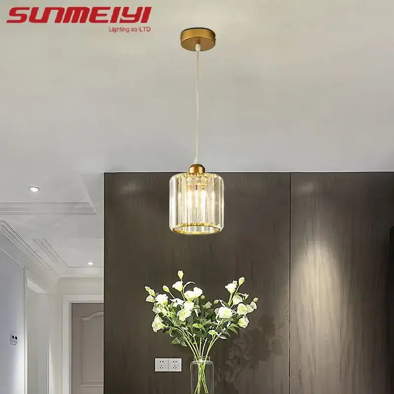 Suspension luminaire cristal doré et noir cylindrique élégant

