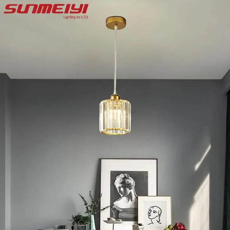Suspension luminaire cristal doré et noir cylindrique élégant

