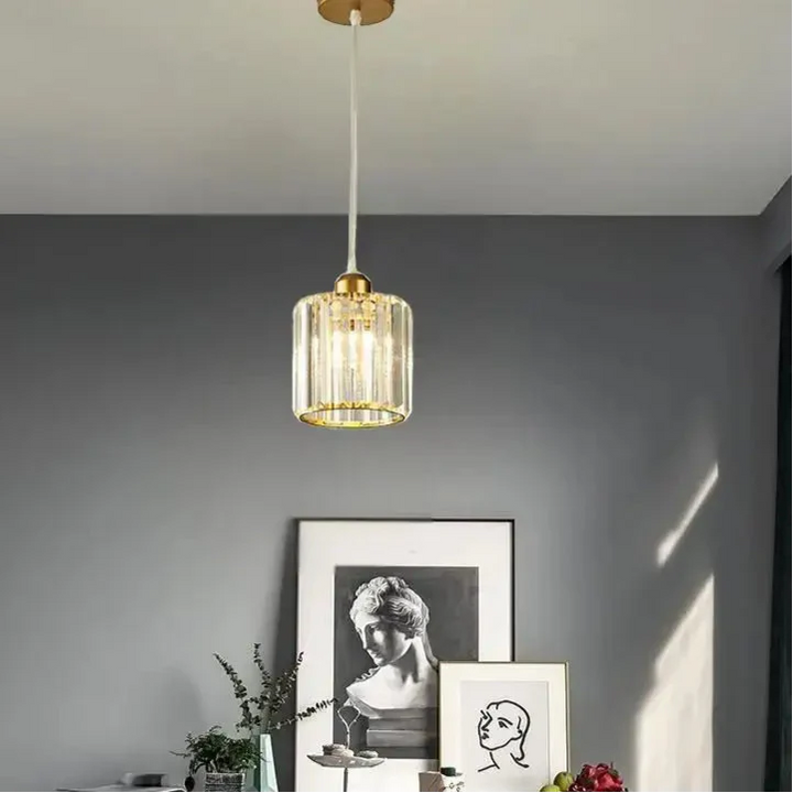 Suspension luminaire cristal doré et noir cylindrique élégant

