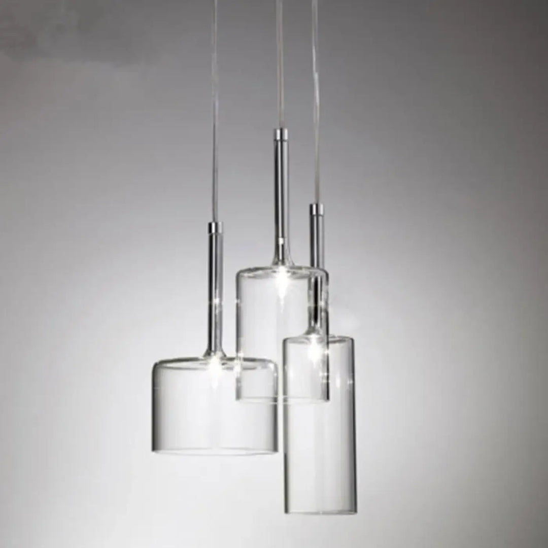 Suspension luminaire cylis avec abat jours cylindriques clairs et tiges chrome modernes en verre