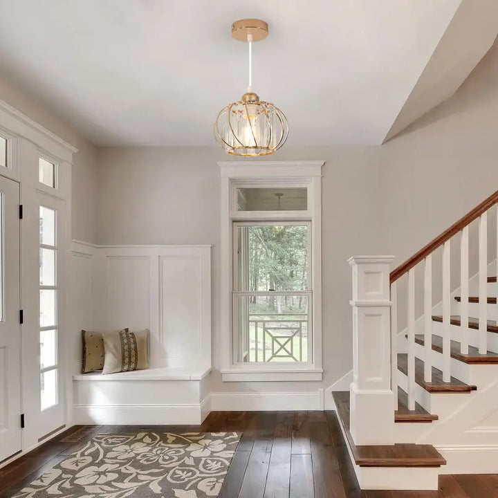 Suspension luminaire design doré cage métal et cristaux luxe