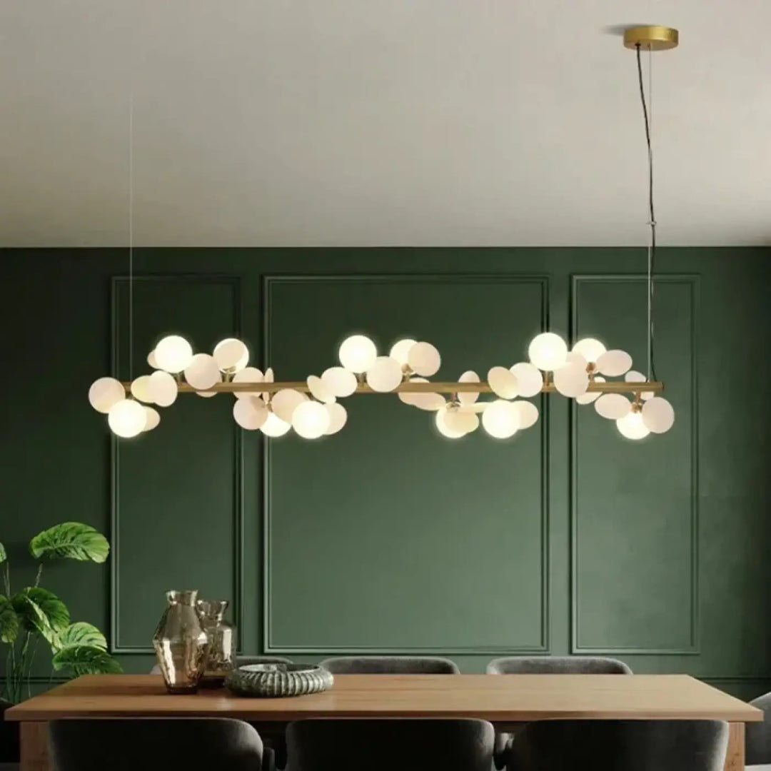 Suspension luminaire orbellia en métal doré avec ampoule incluse et sphères en verre blanc gris pour salle à manger