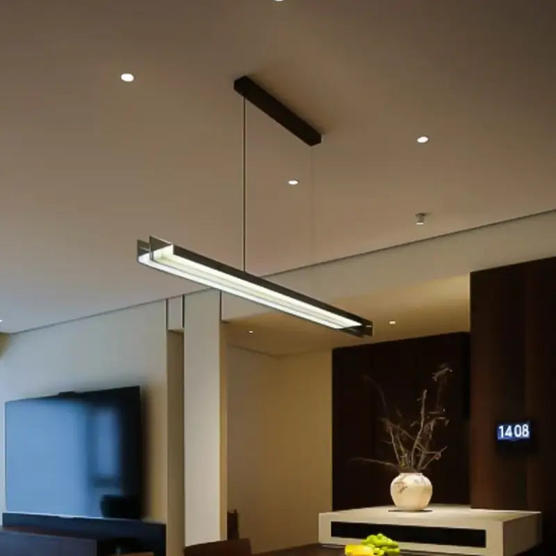 Suspension luminaire design moderne allongée finition dorée noir