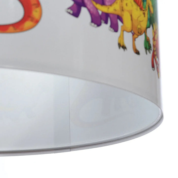 Suspension luminaire enfant avec abat-jour cylindrique blanc translucide et motif dinosaure coloré violet jaune et vert