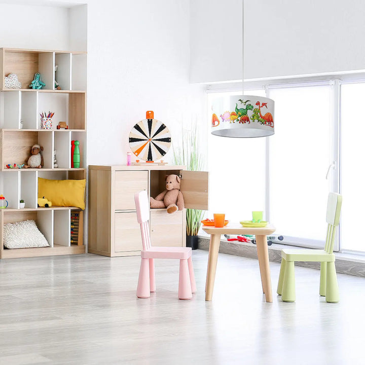 Suspension luminaire enfant avec abat-jour cylindrique blanc orné dillustrations colorées de dinosaures