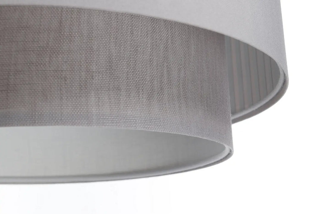 Suspension luminaire grise duo lami line avec abat-jour en lin gris texturé et doublure intérieure côtelée subtile