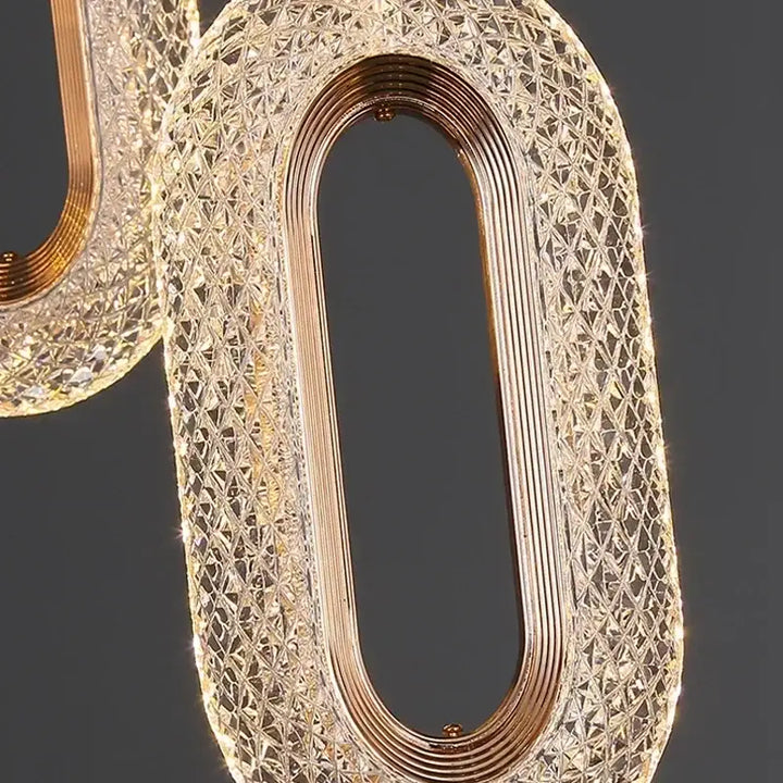 Suspension luminaire LED doré disponible en ovale ou rond

