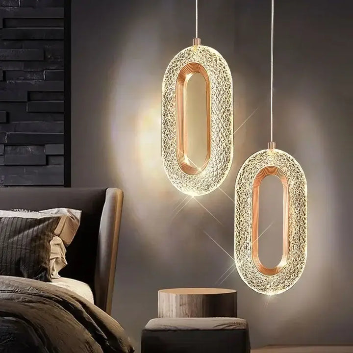 Suspension luminaire LED doré disponible en ovale ou rond

