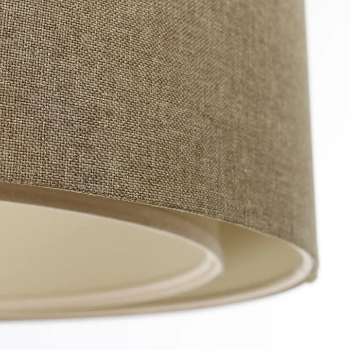 Suspension luminaire marron sable avec abat-jour cylindrique beige en lin texturé intérieur écru lisse