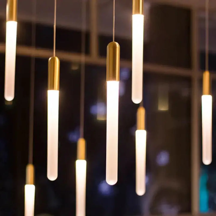 Suspension luminaire minimaliste à tubes lumineux suspendus chic