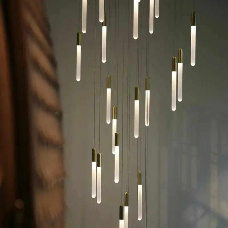 Suspension luminaire minimaliste à tubes lumineux suspendus chic