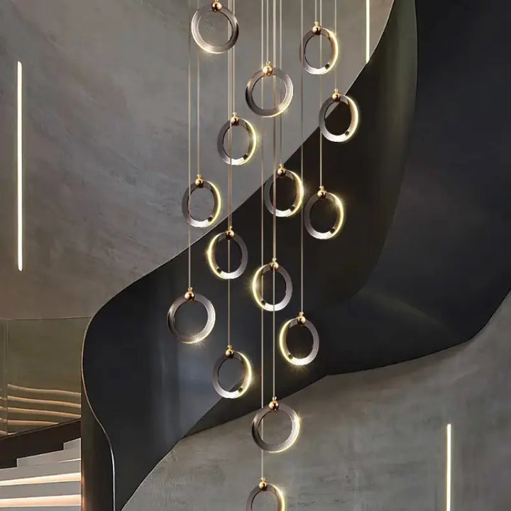 Suspension luminaire moderne anneaux led doré noir