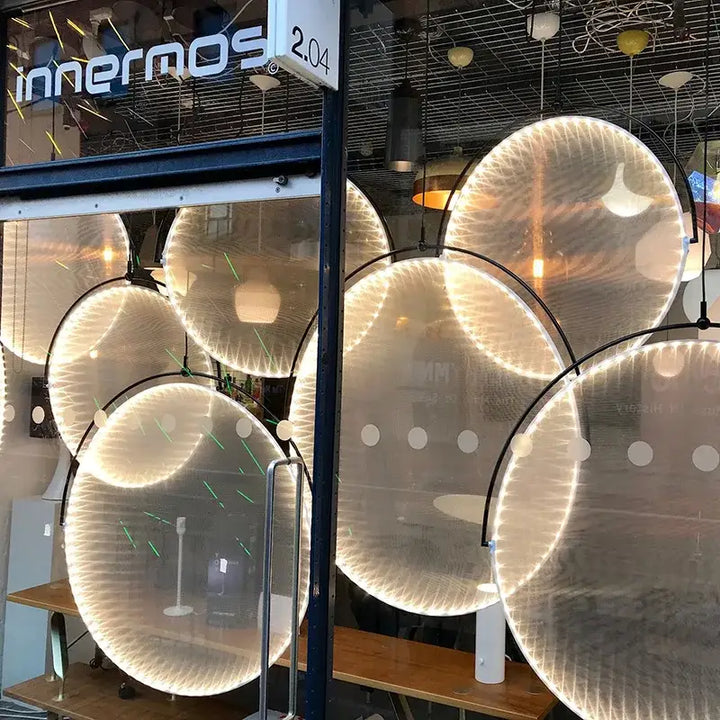 Suspension luminaire moderne design sculptural cercle noir

