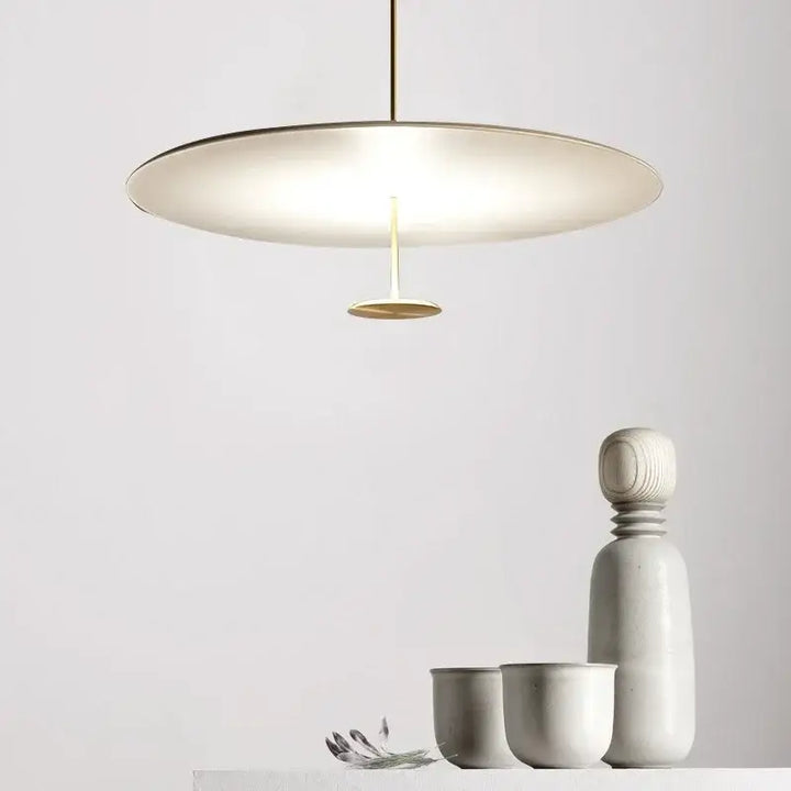 Suspension luminaire moderne avec une silhouette de disque plat

