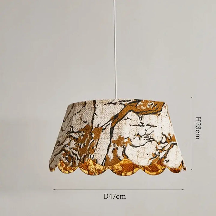 Suspension luminaire en tissu brodé motifs dorés élégants