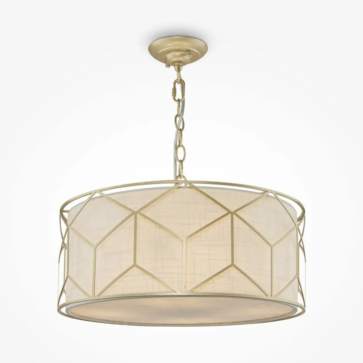 Suspension messina avec monture dorée, cadre métallique géométrique et lumière tamisée grâce à l’abat-jour crème