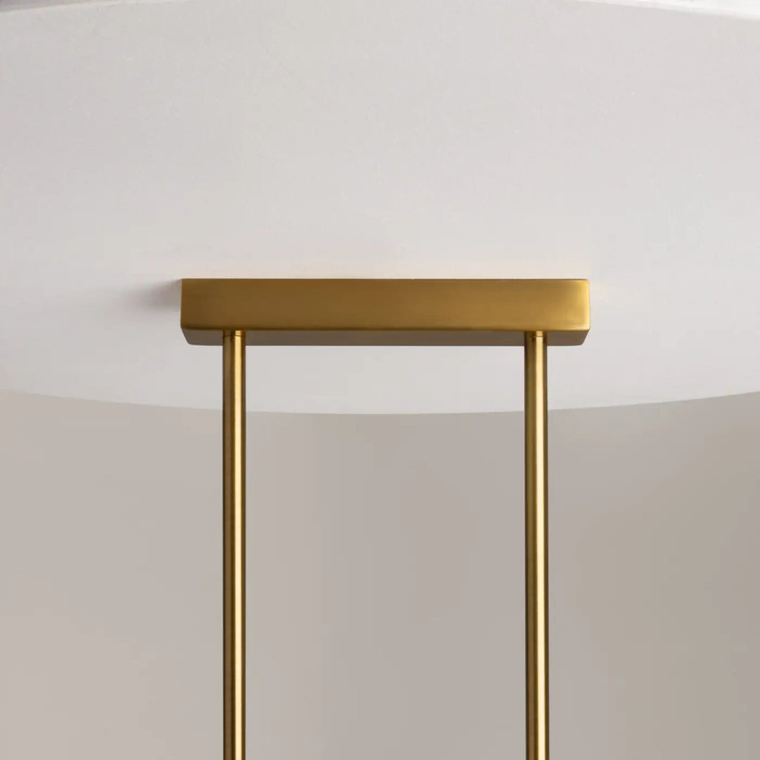 Suspension luminaire miracle linéaire en barre dorée avec support rectangulaire et deux tiges verticales fines