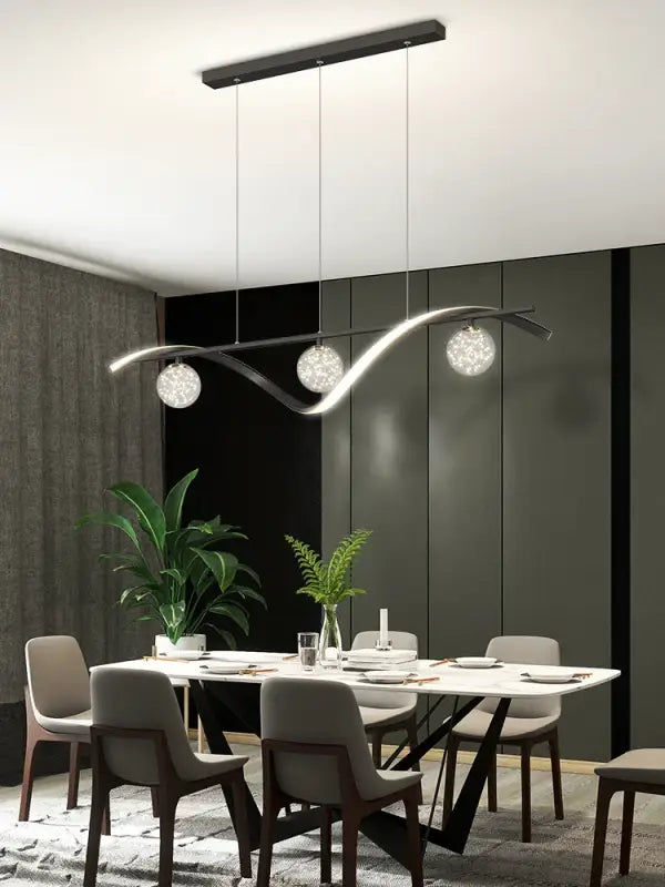 Suspension moderne à vague métallique et boules lumineuses

