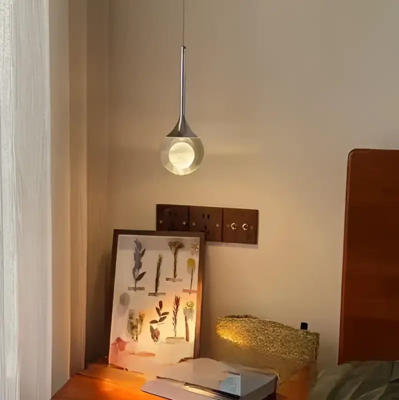 Suspension Moderne LED Goutte Cristal Et Fer Forgé Élégante

