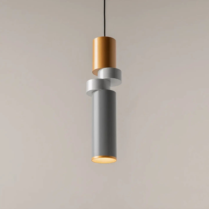 Suspension palette moderne avec sections cylindriques empilées en verre gris mat et disque cuivré brossé
