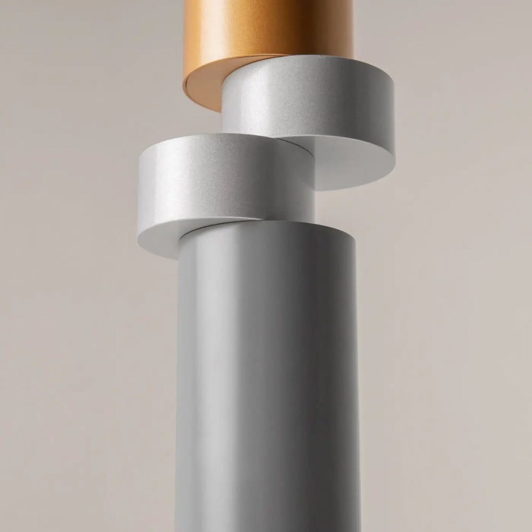 Suspension palette moderne minimaliste avec design cylindrique empilé en verre gris et disque cuivré finitions
