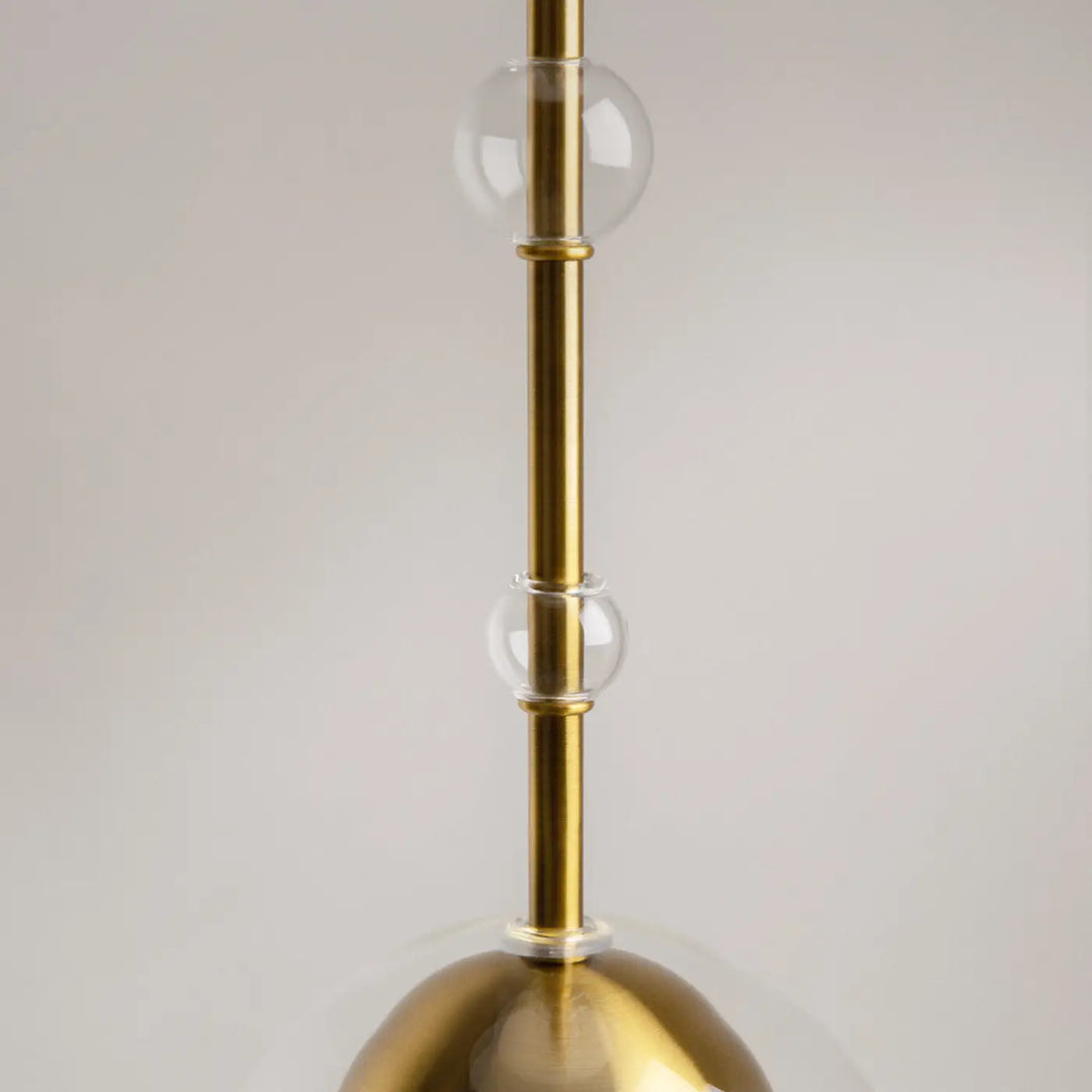 Suspension luminaire ros diffuseur vertical en laiton poli avec boules en verre clair et culot gu10 doré
