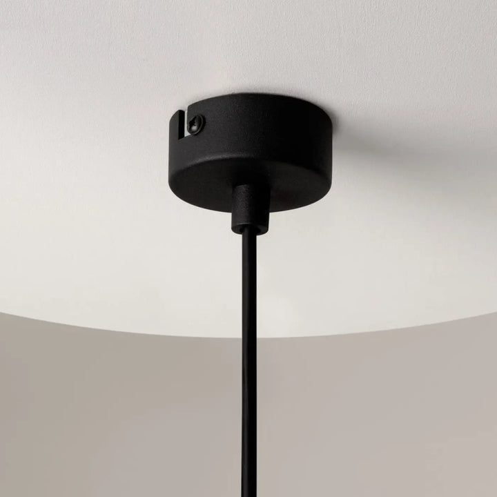 Suspension ros diffuseur vertical en noir mat avec culot gu10 et base cylindrique pour montage au plafond
