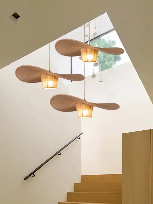 Suspension rotin forme aile naturelle style bohème élégant

