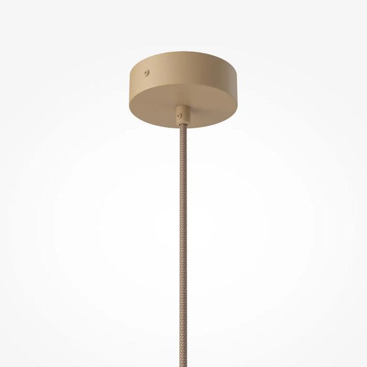 Suspension tavo beige cylindrique avec cordon tressé texturé pour une touche minérale au-dessus d’une table