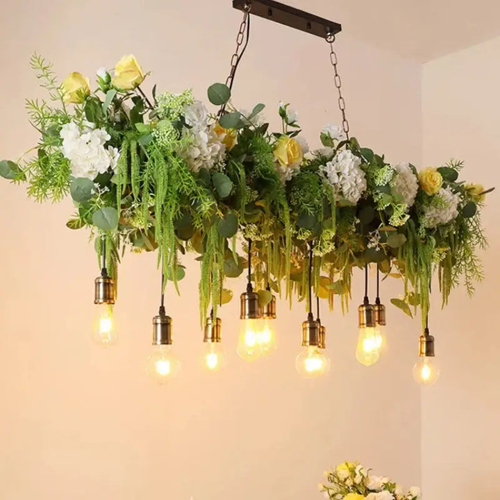 Suspension végétale avec guirlande d’ampoules style naturel cosy

