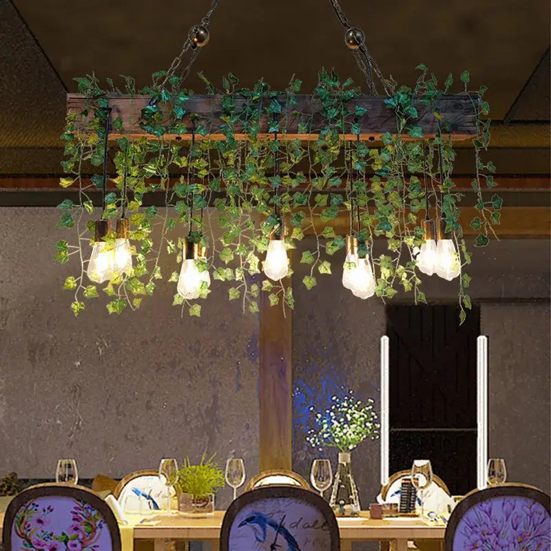 Suspension végétale avec guirlande d’ampoules style naturel cosy

