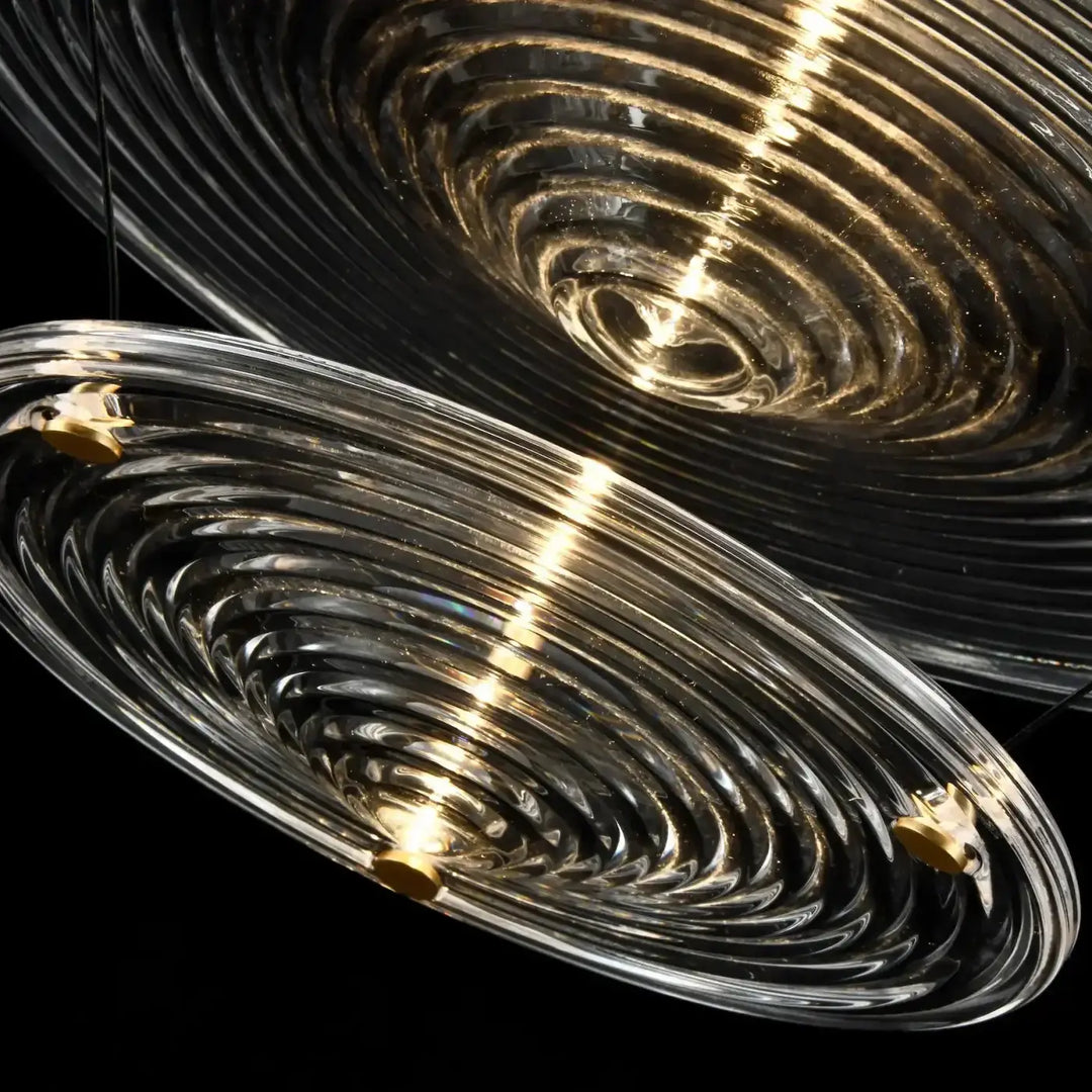 Suspension venise en verre soufflé clair avec motifs circulaires concentriques et fixations dorées